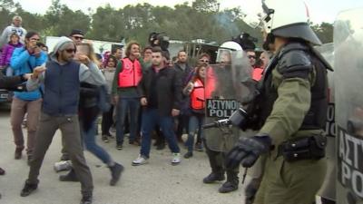 Police and protesters on Lesbos