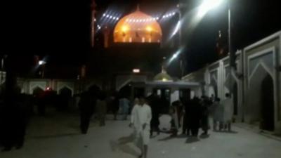 Crowds outside shrine in Sehwan