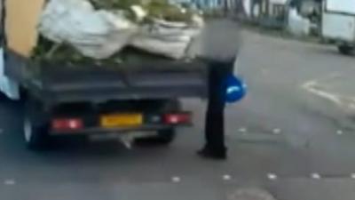 Schoolboy in traffic light near miss