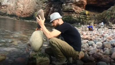 Stone stacker with beard