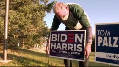 Tim Place and his Biden sign