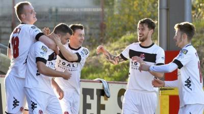 Crusaders players celebrate taking the lead against Portadown