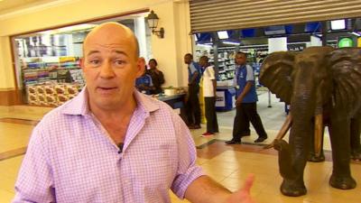 BBC Africa Correspondent Alastair Leithead outside the newly refurbished Nakumatt supermarket