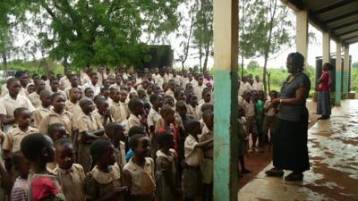 Jacqueline Jumbe-Kahura with pupils