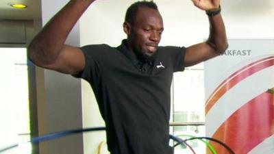 Usain Bolt hula hooping