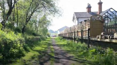 Former station along route