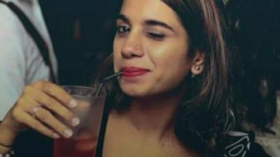 Indian woman drinking