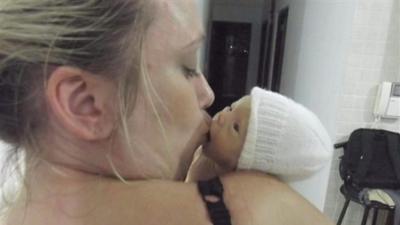 Sharon Halls kissing baby Evie