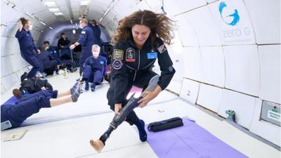 Mary Cooper floating and removing her prosthetic leg mid-parabola