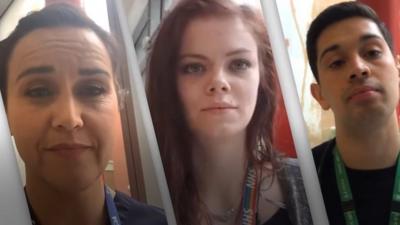 Three NHS workers looking at the camera