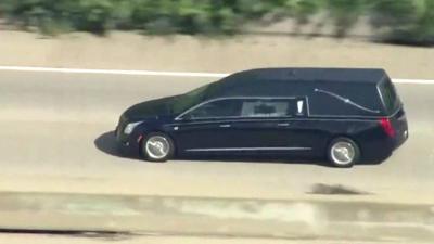 Car with coffin of Muhammad Ali