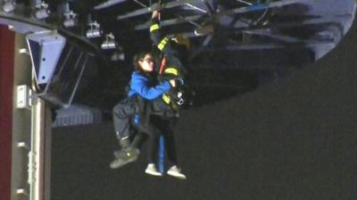 Person being rescued from ride