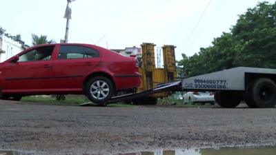 Car being towed