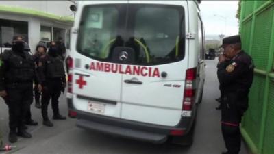 An ambulance leaves Cadereyta prison, Mexico