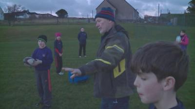 Calum Caimbeul a' teagasg chloinne