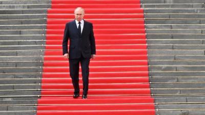 Vladimir Putin on red carpet in Cathedral Square