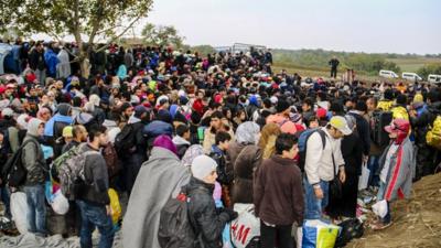 Crowd of people at border