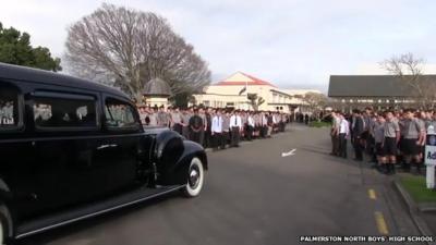 Funeral car arriving at Palmerston North Boys' High School after they have performed a Haka in memory of a favourite teacher who died