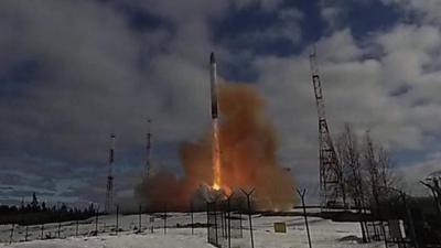 Missile launching in a snowy landscape