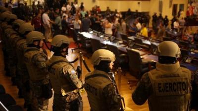 Soldiers line up in El Salvador's national assembly