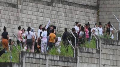 Inmates outside the prison