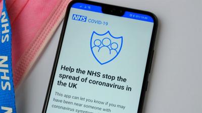 NHS APP open on phone