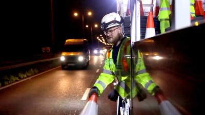 Man with cone