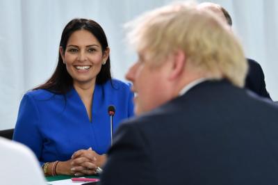 Priti Patel and Boris Johnson