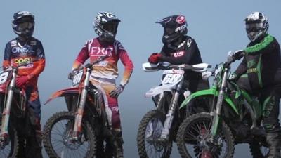 Four motocross riders