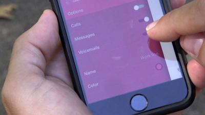 A person holding a phone using the onoff app
