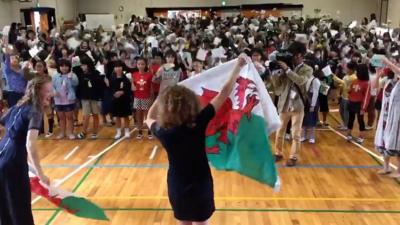 Japanese schoolchildren singing the Welsh national anthem