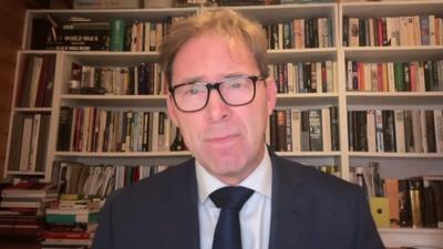 Tobias Ellwood in an office