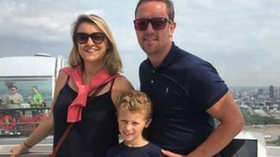 Simon Thomas with his wife and son.