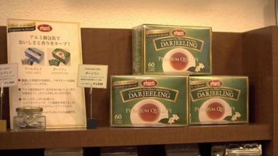Boxes of tea on shelf