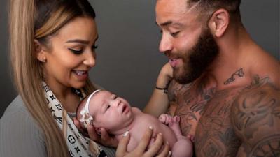 Safiyya Vorajee and Ashley Cain holding Azaylia