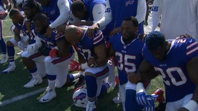 Buffalo Bills players kneel during anthem