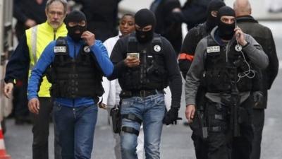 Masked police in Saint Denis