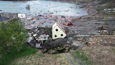 House upside down in the sea