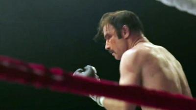 Actor Liev Schreiber in a boxing ring in a scene from Chuck