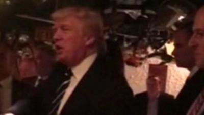 Donald Trump greets diners