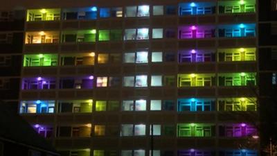 Coloured lights outside flats