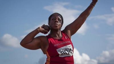 Athlete throwing shotput