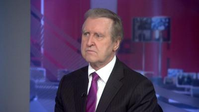 William Cohen seated in BBC Washington studio