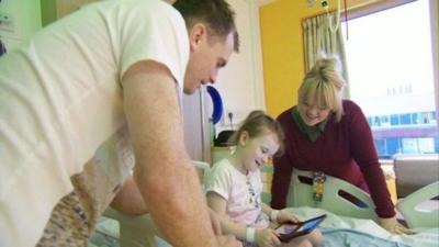 Sophie Mathers and her parents