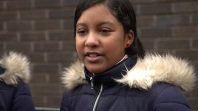 Young student who received laptop donation