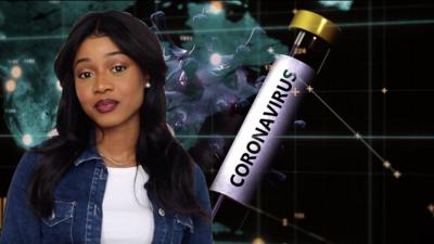 Presenter with graphic of coronavirus vial in background