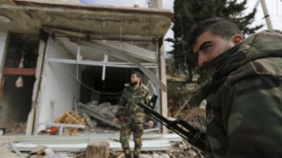 A damaged shop in the town of Rabiya, Syria