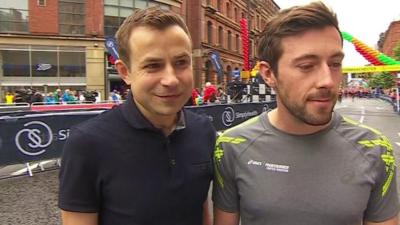 Two amateur runners who provided the defining image of this year's London Marathon meet for the first time to take part in the Great Manchester Run.