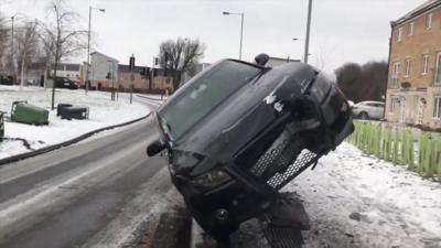 Car on its side