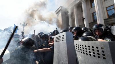 Smoke rises from the parliament building in Kiev